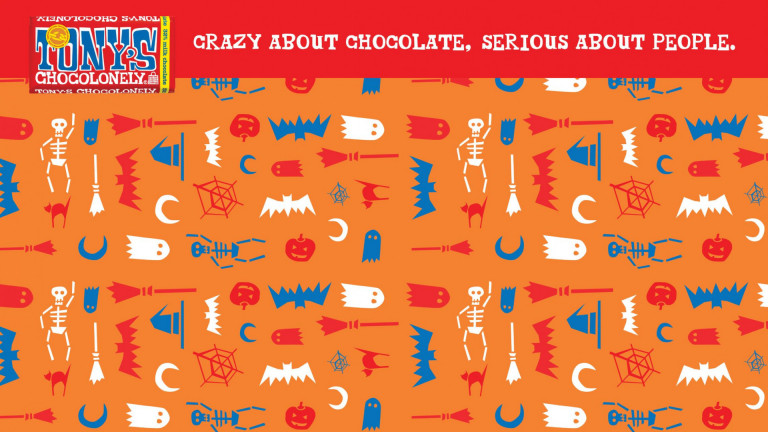 Tony's Chocolonely Halloween background - orange with red, white and blue elements like witch hats, brooms, skeletons, webs and bats